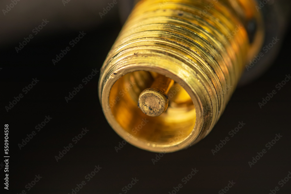 Close-up tyre valve on car wheel nipple Close-up tyre valve on car wheel nipple