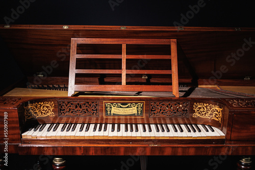 фотографія Antique inlaid Wood Piano, Music Instrument Theme