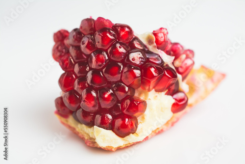 pomegranate fruit close isolated on white