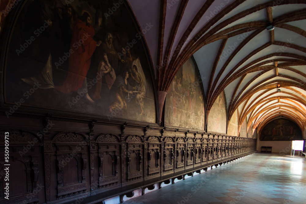 Fototapeta premium Pelplin, Poland - September 1, 2016: The cloister around an inner courtyard in the Abbey Cistercian, now the Cathedral of Pelpinie