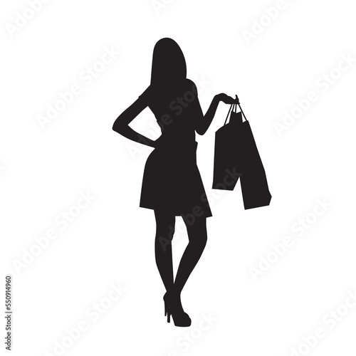 Young woman carrying shopping bag. Vector silhouette.