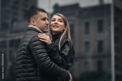 A couple in love in the central metropolis of Ukraine. Love story on the background of skyscrapers © flywish
