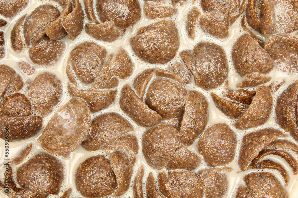 Fototapeta premium Full frame background of chocolate cornflakes cereal breakfast