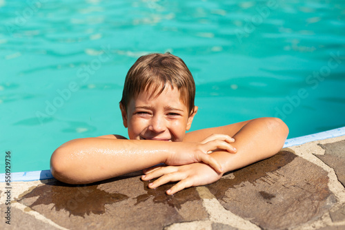 Handsome smiling swimmer in the pool © Aleksandra