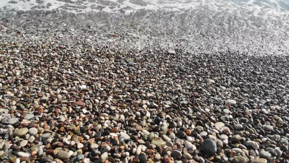 Big waves wash the pebble shore on the beach in Antalya, Turkey. Video 22 seconds, with sound. Natural summer landscape by the ocean Big waves wash the pebble shore on the beach in Antalya, Turkey. Video 22 seconds, with sound. Natural summer landscape by the ocean
