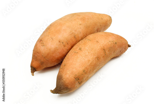 Two sweet potatoes isolated on white background