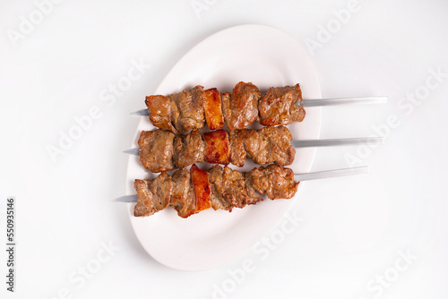 lamb kebab on a white background