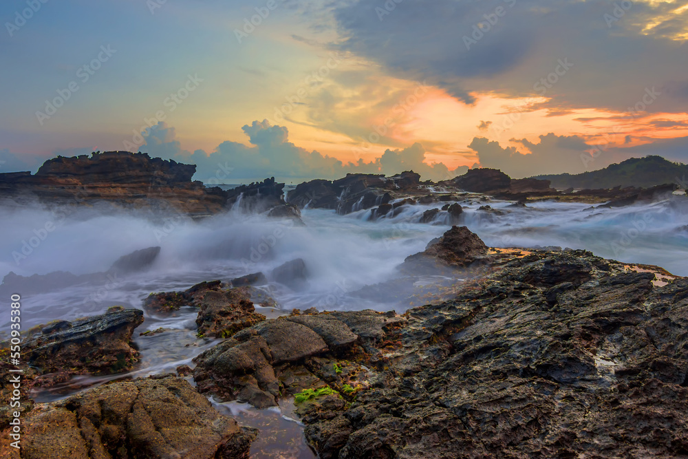 Rock and waves at savarna beach, Indonesia