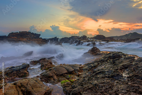 Rock and waves at savarna beach, Indonesia