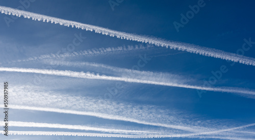 Cirrocumulus clouds that form in the sky from condensation trails left by aircraft