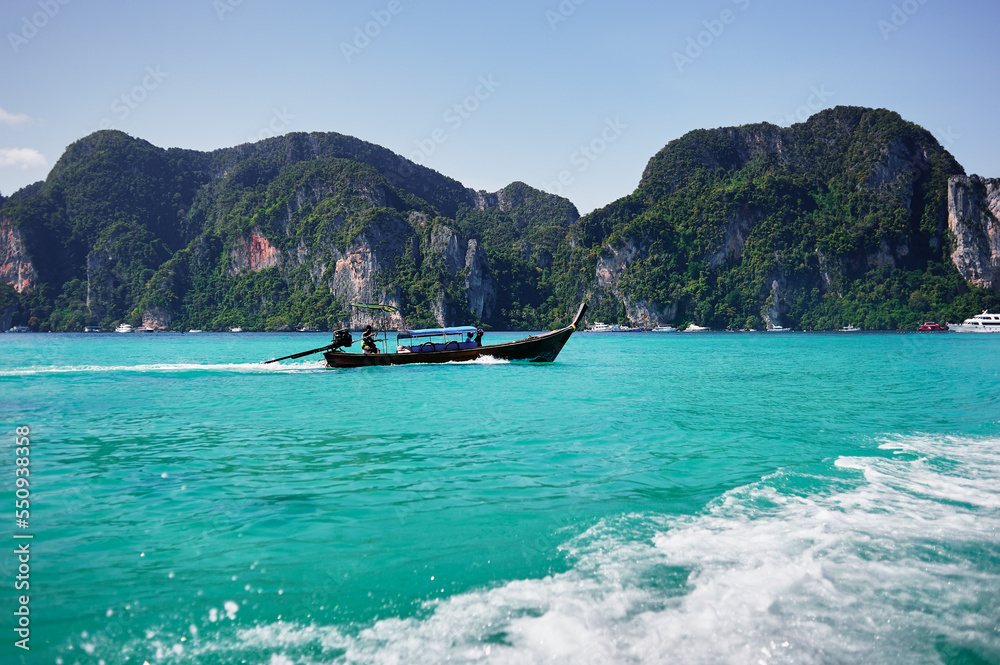 Vacation in Thailand, Phi Phi Island. Beautiful landscape with sea, boat and rocks.