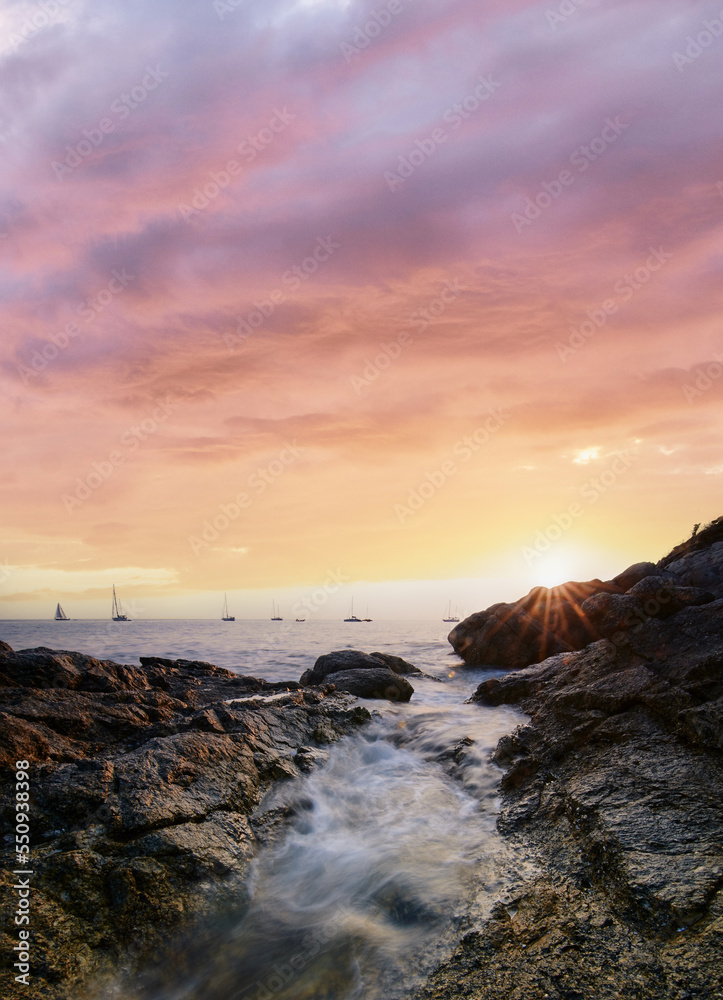 Sea landscape with sunset sky and boats on the horizon Sea landscape with sunset sky and boats on the horizon