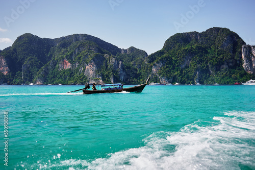 Vacation in Thailand, Phi Phi Island. Beautiful landscape with sea, boat and rocks. © luengo_ua