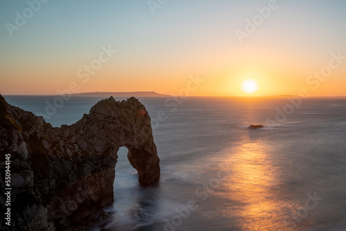 Long exposure of the calm sea at Durdle Door on the Jurassic Coast in Dorset