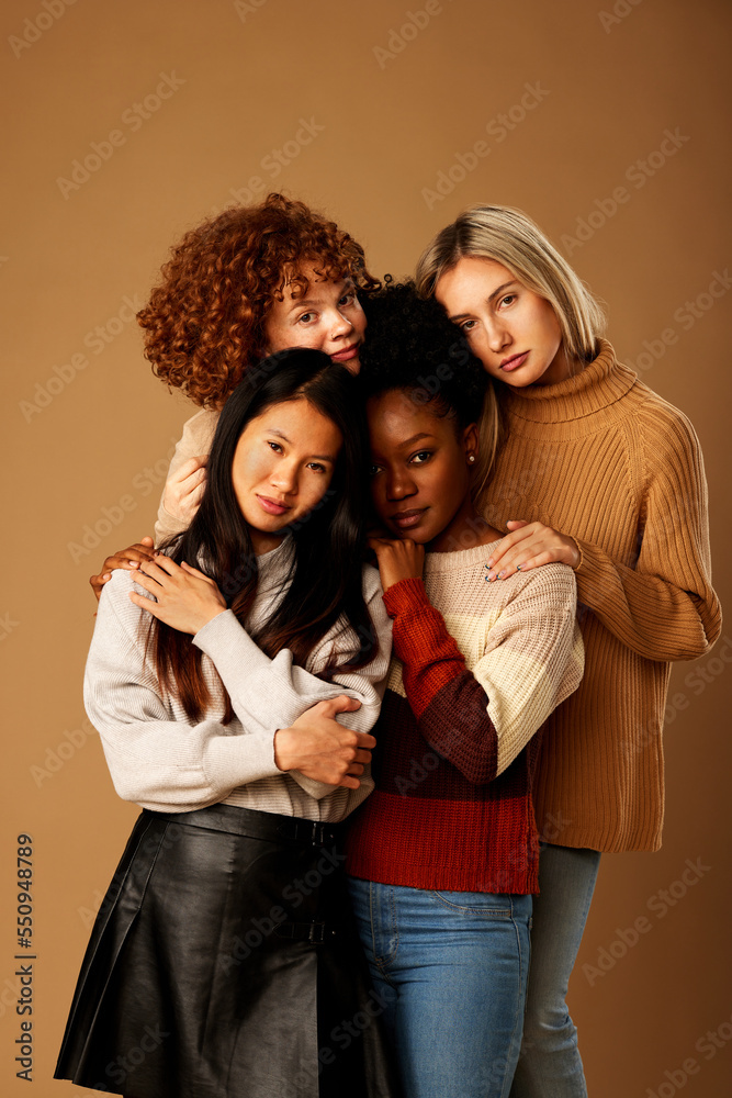 Studio shot of a multicultural beautiful girls with natural skin posing.