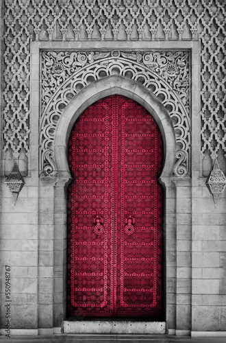 Arabic oriental styled door in Morocco. New 2023 trending PANTONE 18-1750 Viva Magenta colour