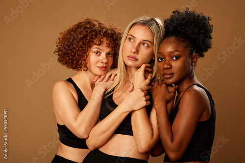 Tablou pe pânză Studio shot of a multiracial beautiful girls with natural skin posing