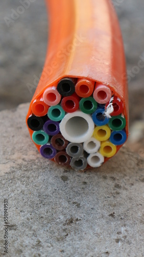 Inside of an optical fiber cable used for telecommunication and internet purposes photo