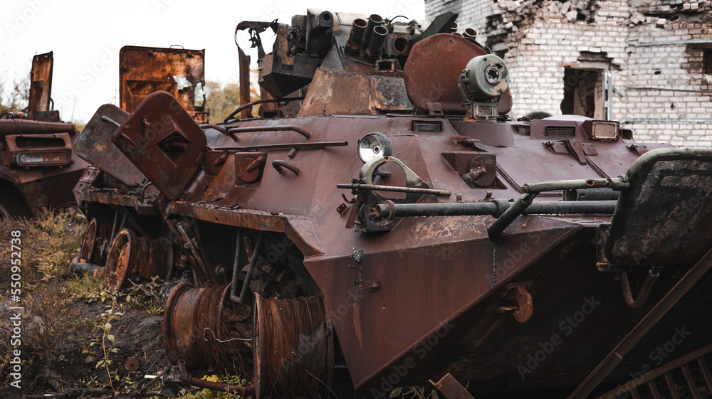 War in Ukraine, cemetery of military equipment, destroyed armored personnel carrier of Russia, City of Izyum, Kharkiv region. War in Ukraine, cemetery of military equipment, destroyed armored personnel carrier of Russia, City of Izyum, Kharkiv region.