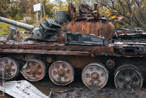 War in Ukraine, destroyed Russian tank, T62 tank, side view, City of Izyum, Kharkiv region.