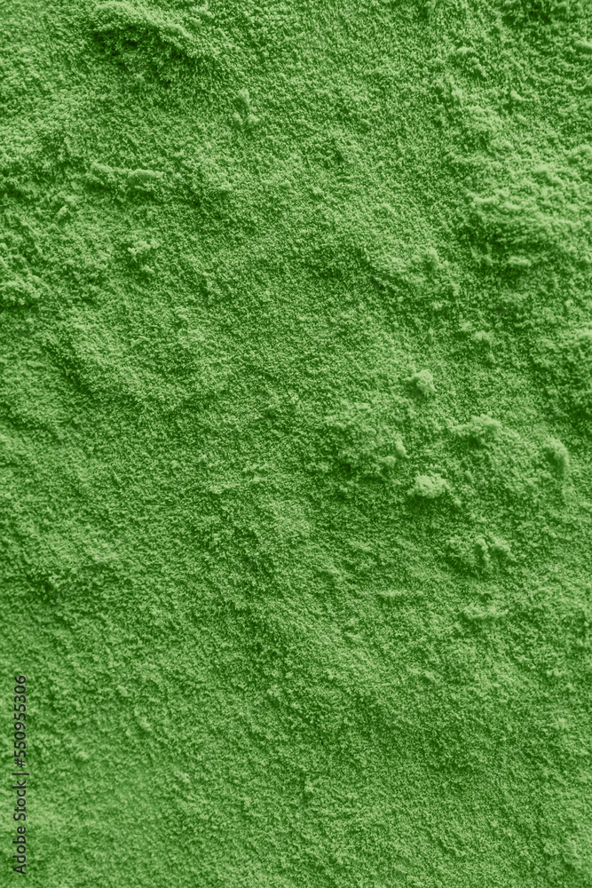 Green powder surface close-up, abstract background Green powder surface close-up, abstract background