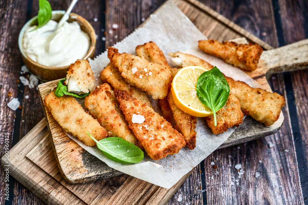 Allasca Pollock Fish Bites in a crispy Tempura Batter.Fish and chips .Close up of crispy breaded
