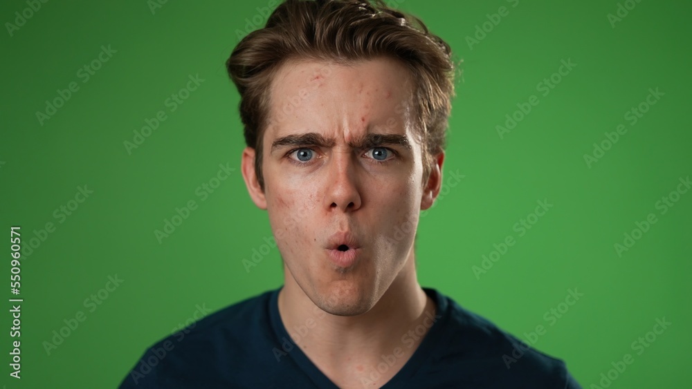 Portrait of smiling happy young hipster man 20s in slow motion isolated on solid yellow background with copy space in studio Portrait of smiling happy young hipster man 20s in slow motion isolated on solid yellow background with copy space in studio
