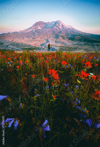 Girl standing in front of volcano