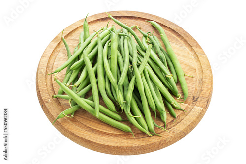 Green beans handful on a cutting board isolated on white background.