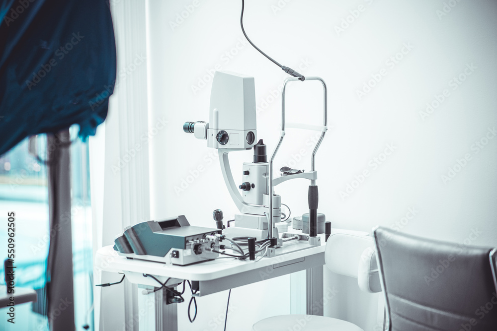 Different devices for measuring diopter and eye examination. Visit at the ophtalmologist, eye doctor, with all devices and appliances. Laser surgery.