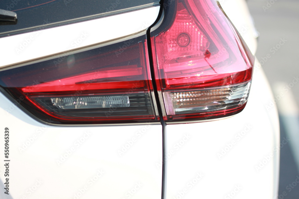 Modern car tail light.white modern car back light.closeup shot.
