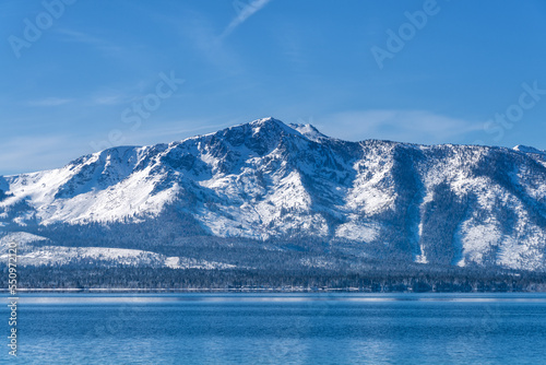 Snow Covered Desolation Wilderness Peaks and Lake Tahoe from Nevada Beach © Lisa