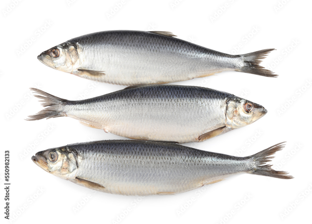 Delicious whole salted herrings isolated on white, top view Delicious whole salted herrings isolated on white, top view