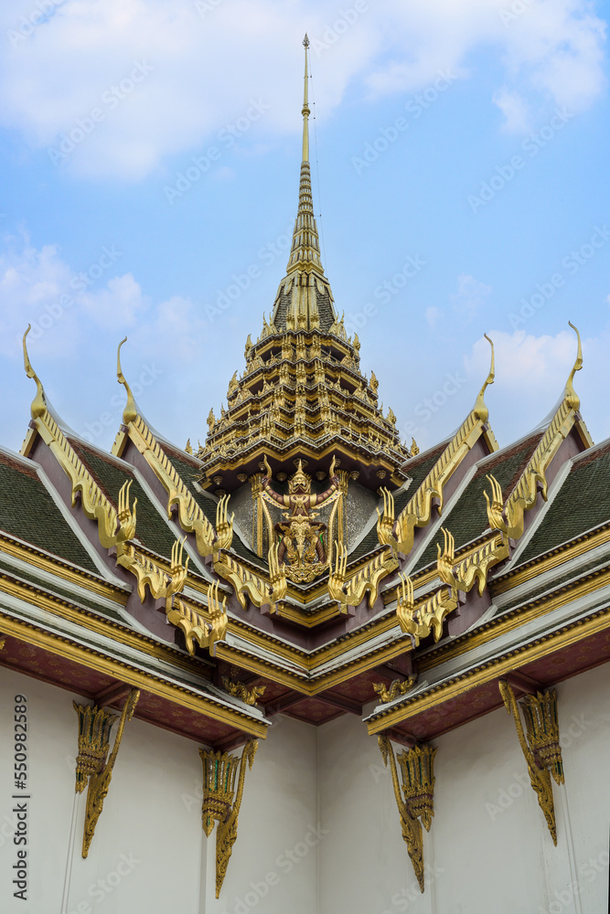 Thai architecture decoration castle roof of Dusit Maha Prasat Hall in Grand Palace Bangkok Thailand