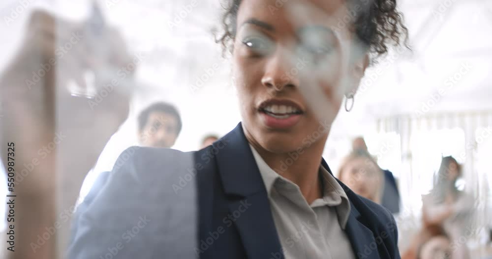 Woman, writing on glass and business meeting or leader presenting in office for workshop, seminar and corporate management training. Businesswoman leadership, employee coaching and share idea vision