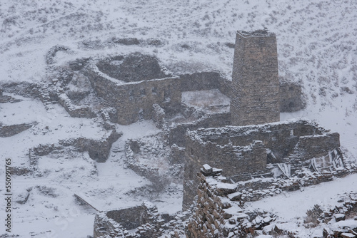 Galiat village at winter snowfall. Mountain Digoria, North Ossetia, Russia. photo