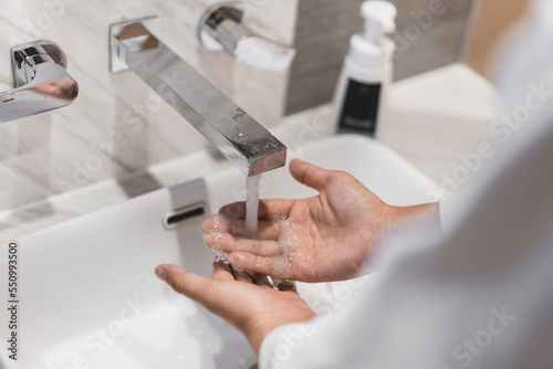 Close up of people washing hand carefully.
