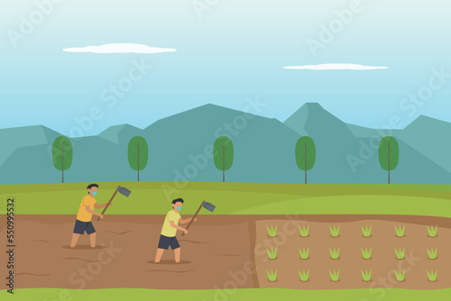 Kids wearing face mask while hoeing rice field