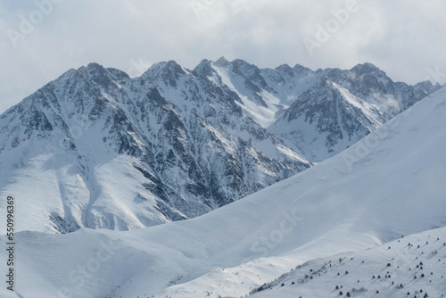 Caucasian mountains on winter day. View from Kamunta village. Mountain Digoria, North Ossetia, Russia. © Kirill
