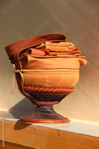 Monk's alms bowl: Put it on the table to offer food to monks at the funeral according to Thai tradition
