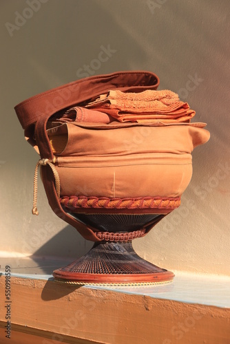 Monk's alms bowl: Put it on the table to offer food to monks at the funeral according to Thai tradition