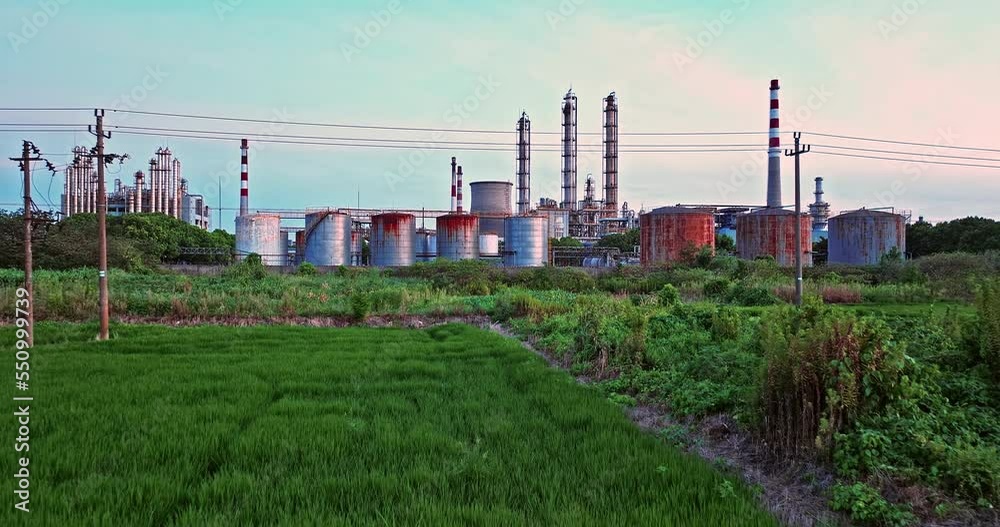 Aerial view of chimneys of power plant, an industrial district. Modern large thermal power plant. Generation through coal switched over to natural gas. Aerial view of chimneys of power plant, an industrial district. Modern large thermal power plant. Generation through coal switched over to natural gas.