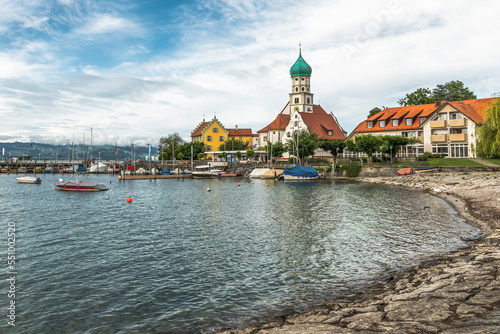 Harbor with catholic church of St. George in Wasserburg on Lake Constance  Lindau District  Bavaria  Germany
