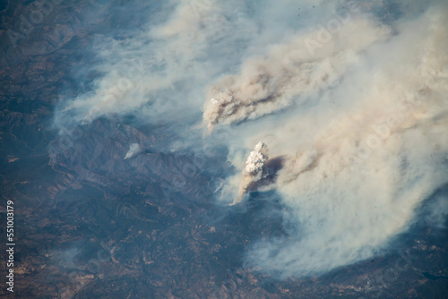 Aerial view of Carr and Ferguson Fire in Northern California. Digitally enhanced. Elements of this image furnished by NASA. photo