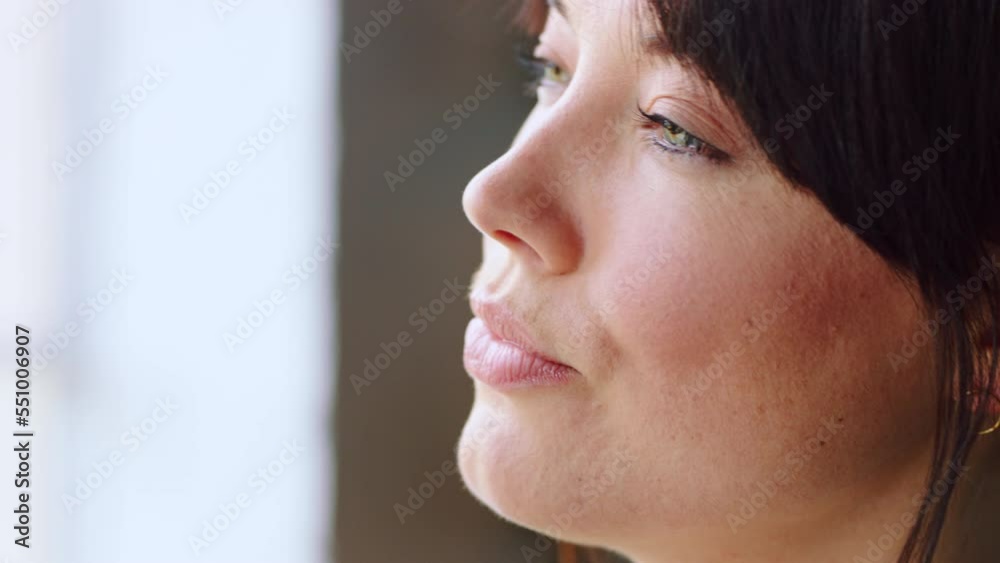 Face, tea and thinking with a woman drinking a beverage from a cup by a window in her home alone. Morning, coffee and idea with a young female enjoying a drink during chill or free time in a house Face, tea and thinking with a woman drinking a beverage from a cup by a window in her home alone. Morning, coffee and idea with a young female enjoying a drink during chill or free time in a house