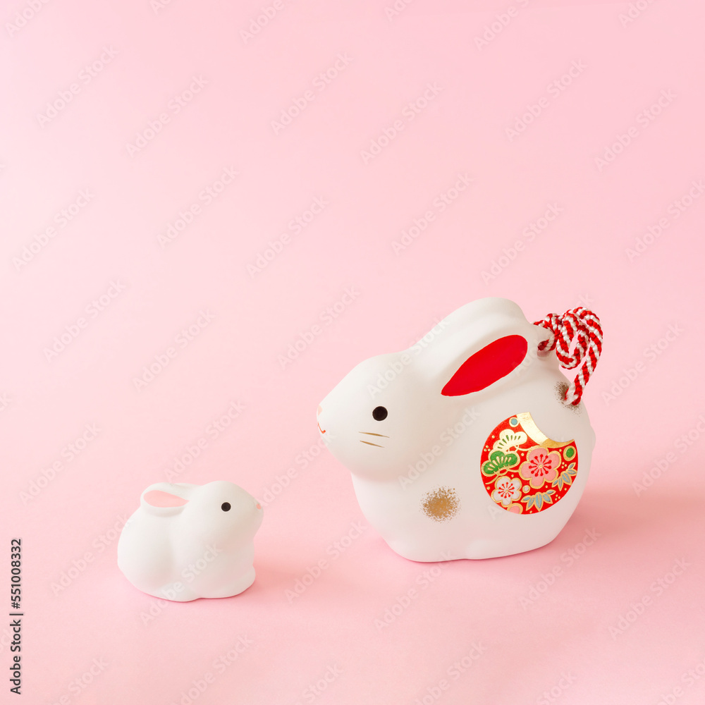Japanese New Year's card material. zodiac rabbit. Rabbit on pink background. 日本の正月素材。干支のウサギ。ピンク背景上のウサギ。 Japanese New Year's card material. zodiac rabbit. Rabbit on pink background. 日本の正月素材。干支のウサギ。ピンク背景上のウサギ。