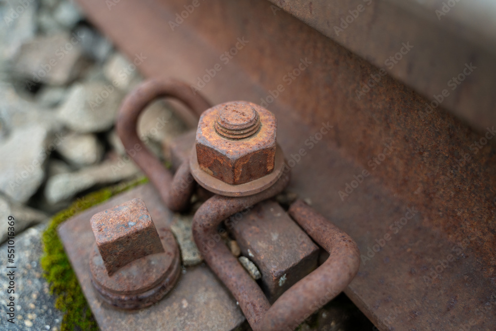 Close up of a rusted bolt from a railroad track Close up of a rusted bolt from a railroad track
