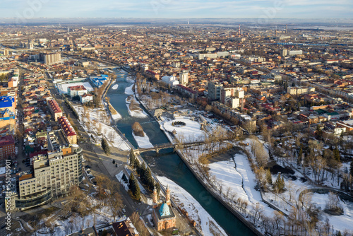 Drone view of Vladikavkaz and Terek river on sunny winter day. North Ossetia  Russia.