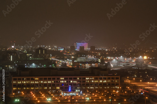 View of Downtown Detroit from the Fisher Building at night on a cloudy day. © Davslens Photography