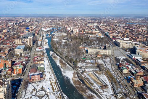 Aerial view of Vladikavkaz and Terek river on sunny winter day. North Ossetia, Russia.